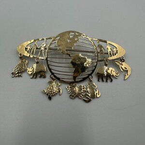 Vintage Wild Bryde Globe Brooch Gold Tone Animal Dangle Elephant Owl Turtle